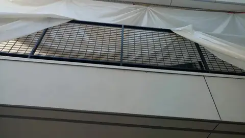 Grid-pattern guard panel during installation