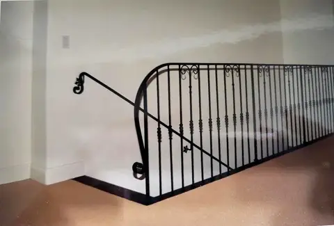 Landing railing with an attached stair handrail