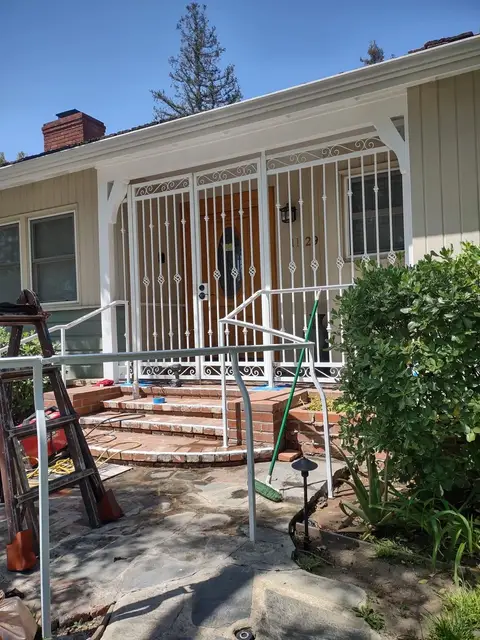 Porch security gate and railings during installation