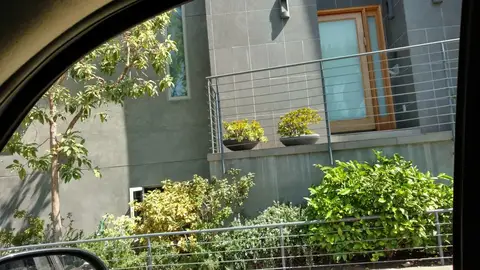 Cable railing on a modern terrace with planter boxes