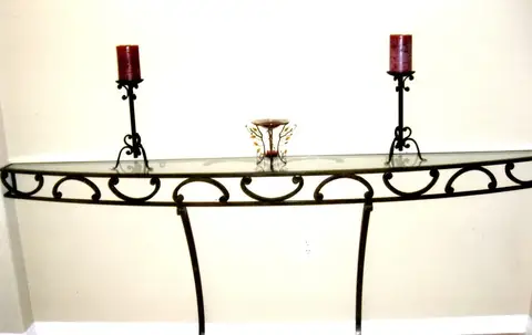 Hand-forged iron console table with candle holders
